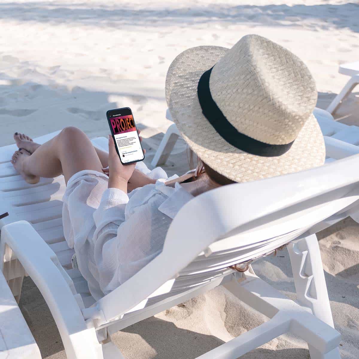 Relaxed student on the beach with INU app